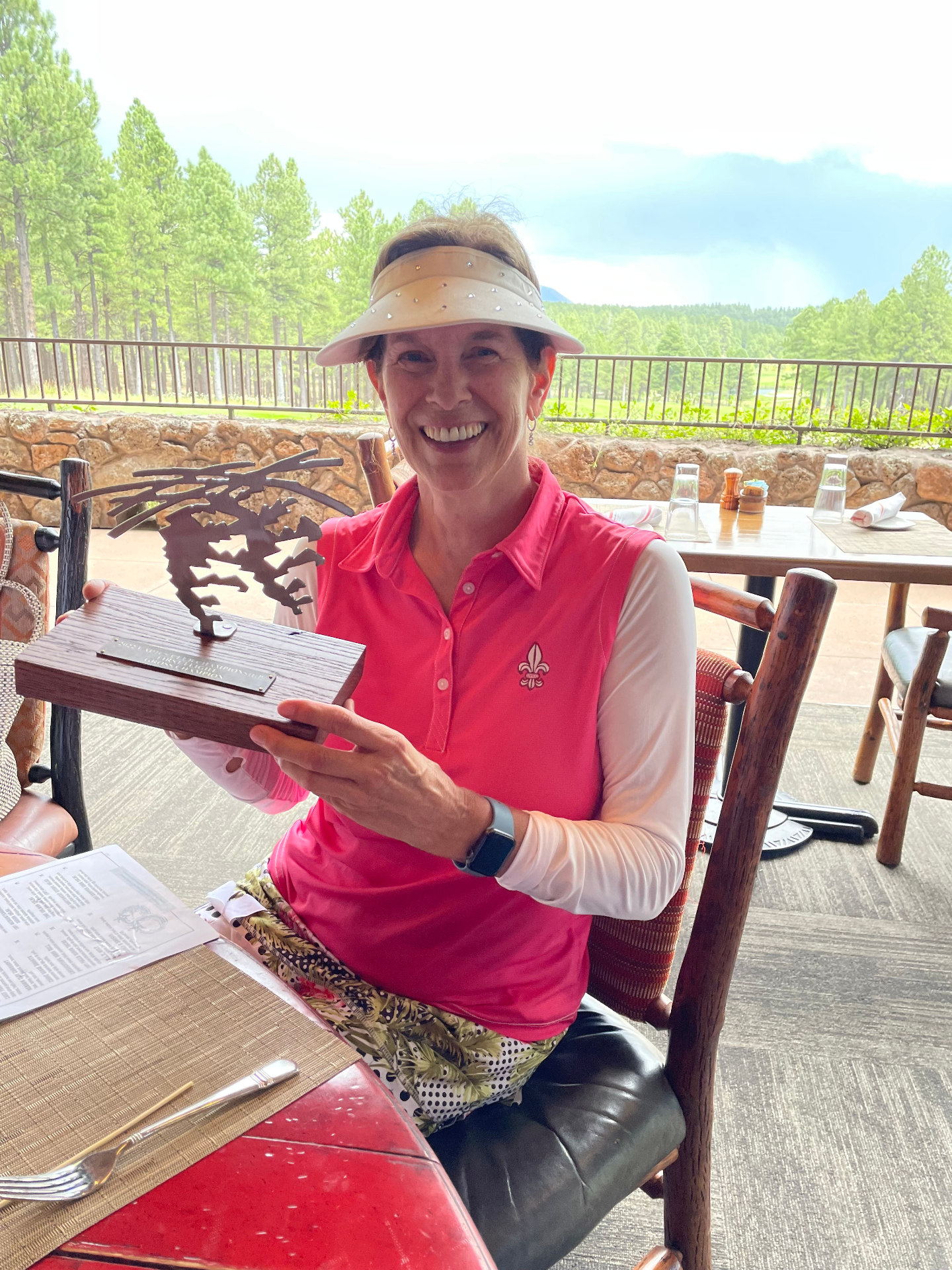 Karen playing golf after recovery